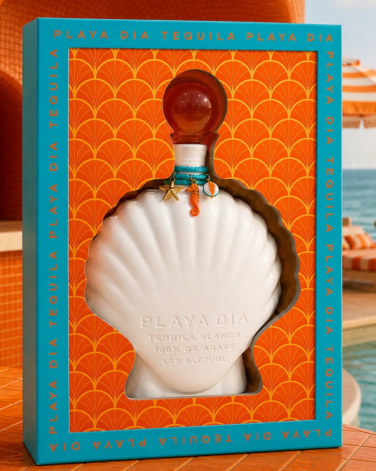 PLAYA DIA Blanco bottle in its gift box by the pool